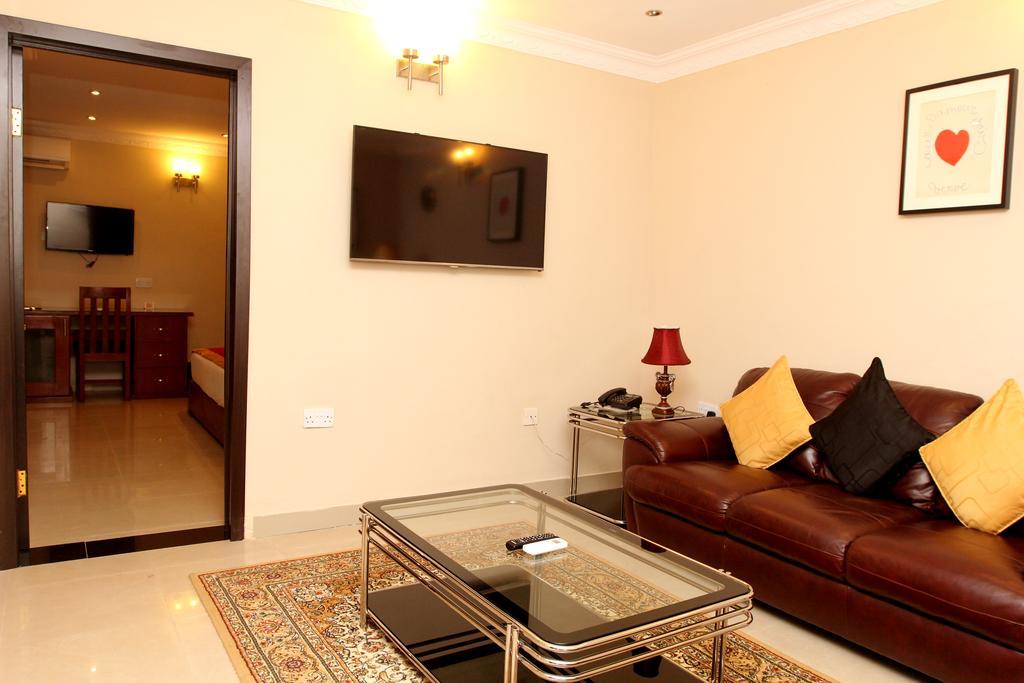 Apartment Royale Hotel & Suite Lagos Quarto foto
