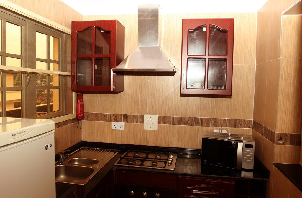 Apartment Royale Hotel & Suite Lagos Quarto foto